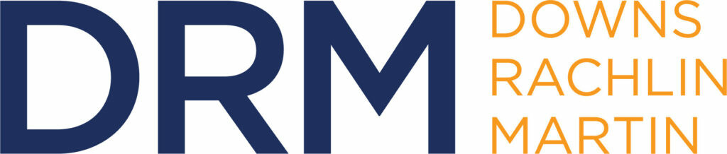 Logo of Downs Rachlin Martin, featuring "DRM" in blue and full name in orange.
