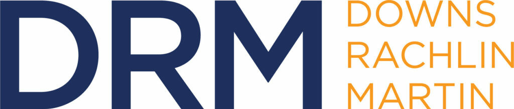 Logo of Downs Rachlin Martin, featuring "DRM" in blue and full name in orange.