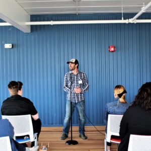 Man speaking on a microphone