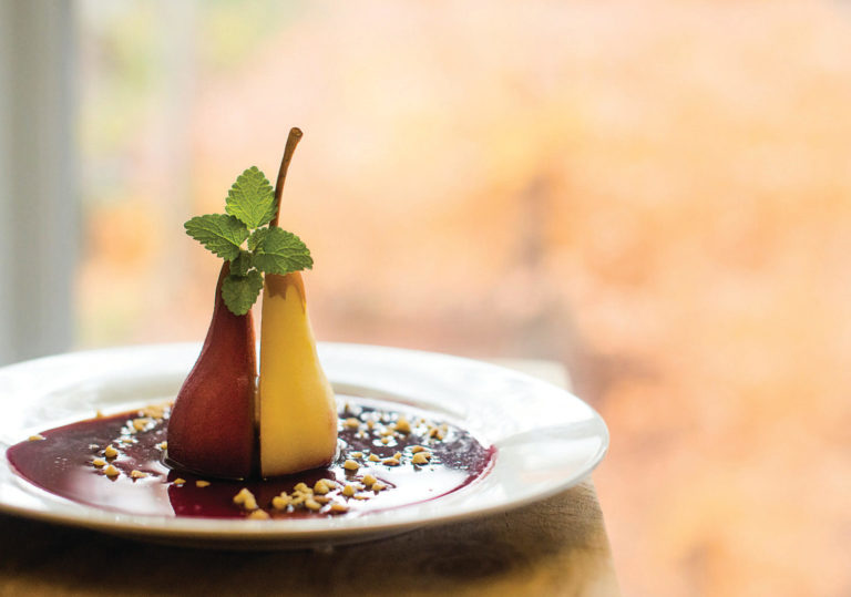 photo of beautiful dessert dish featuring pears and chocolate sauce